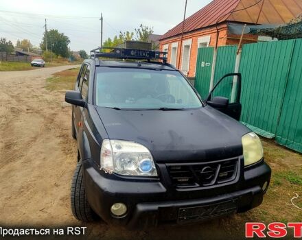 Черный Ниссан ИксТрейл, объемом двигателя 2.2 л и пробегом 357 тыс. км за 4000 $, фото 1 на Automoto.ua