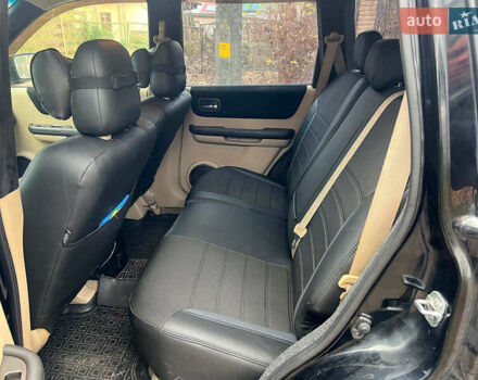 Черный Ниссан ИксТрейл, объемом двигателя 2 л и пробегом 215 тыс. км за 6490 $, фото 16 на Automoto.ua