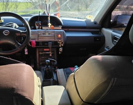 Черный Ниссан ИксТрейл, объемом двигателя 2 л и пробегом 365 тыс. км за 4013 $, фото 1 на Automoto.ua