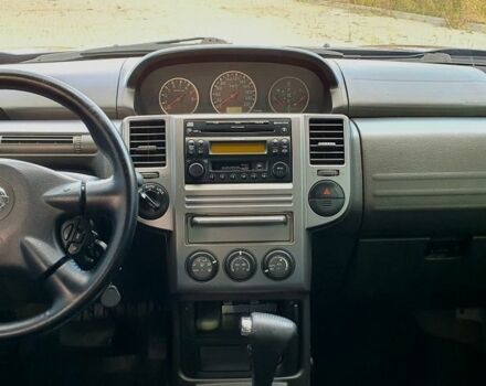 Черный Ниссан ИксТрейл, объемом двигателя 2.5 л и пробегом 260 тыс. км за 5150 $, фото 6 на Automoto.ua