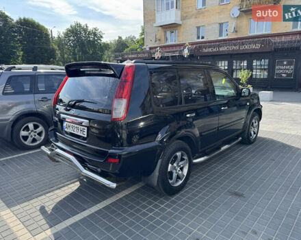 Черный Ниссан ИксТрейл, объемом двигателя 2.5 л и пробегом 318 тыс. км за 8000 $, фото 4 на Automoto.ua