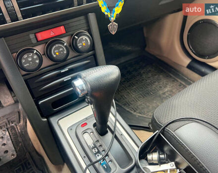 Черный Ниссан ИксТрейл, объемом двигателя 2 л и пробегом 215 тыс. км за 6490 $, фото 13 на Automoto.ua