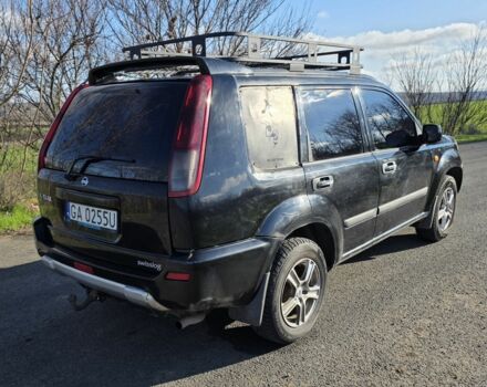 Черный Ниссан ИксТрейл, объемом двигателя 2 л и пробегом 365 тыс. км за 4023 $, фото 5 на Automoto.ua