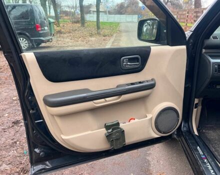 Черный Ниссан ИксТрейл, объемом двигателя 2 л и пробегом 215 тыс. км за 6490 $, фото 8 на Automoto.ua