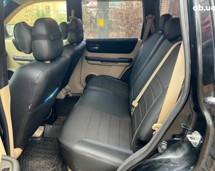 Чорний Ніссан ІксТрейл, об'ємом двигуна 2 л та пробігом 215 тис. км за 6490 $, фото 16 на Automoto.ua