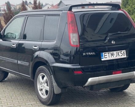 Черный Ниссан ИксТрейл, объемом двигателя 2.2 л и пробегом 290 тыс. км за 3841 $, фото 3 на Automoto.ua