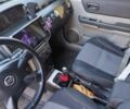 Черный Ниссан ИксТрейл, объемом двигателя 2.2 л и пробегом 285 тыс. км за 4500 $, фото 4 на Automoto.ua