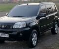 Черный Ниссан ИксТрейл, объемом двигателя 2.5 л и пробегом 260 тыс. км за 5150 $, фото 3 на Automoto.ua