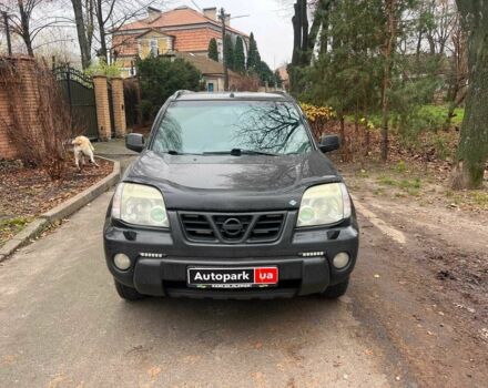 Черный Ниссан ИксТрейл, объемом двигателя 2 л и пробегом 215 тыс. км за 6490 $, фото 1 на Automoto.ua