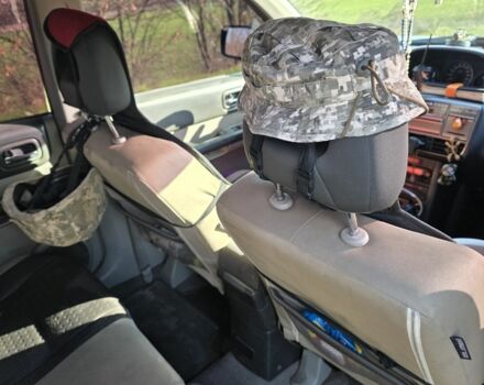 Черный Ниссан ИксТрейл, объемом двигателя 2 л и пробегом 365 тыс. км за 4013 $, фото 4 на Automoto.ua