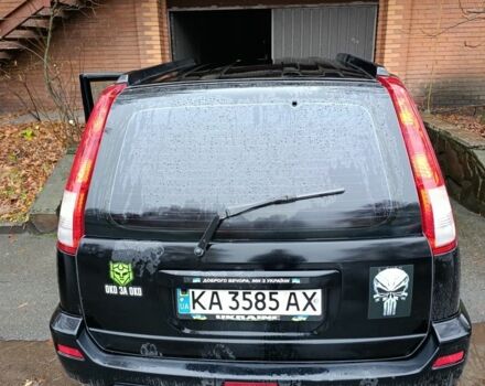 Чорний Ніссан ІксТрейл, об'ємом двигуна 2 л та пробігом 213 тис. км за 7538 $, фото 5 на Automoto.ua