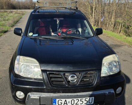 Черный Ниссан ИксТрейл, объемом двигателя 2 л и пробегом 365 тыс. км за 4013 $, фото 3 на Automoto.ua