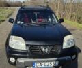 Черный Ниссан ИксТрейл, объемом двигателя 2 л и пробегом 365 тыс. км за 4013 $, фото 3 на Automoto.ua