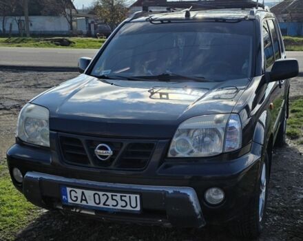 Черный Ниссан ИксТрейл, объемом двигателя 2 л и пробегом 365 тыс. км за 4013 $, фото 10 на Automoto.ua