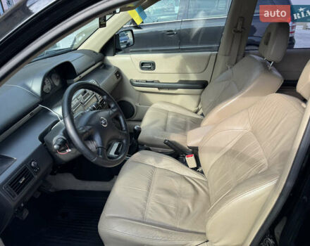 Черный Ниссан ИксТрейл, объемом двигателя 2.5 л и пробегом 318 тыс. км за 8000 $, фото 8 на Automoto.ua