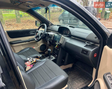 Черный Ниссан ИксТрейл, объемом двигателя 2 л и пробегом 215 тыс. км за 6490 $, фото 17 на Automoto.ua