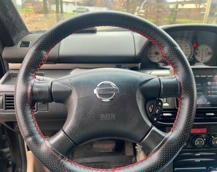 Черный Ниссан ИксТрейл, объемом двигателя 2 л и пробегом 215 тыс. км за 6490 $, фото 11 на Automoto.ua