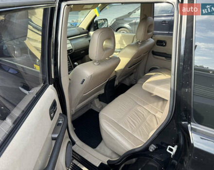 Черный Ниссан ИксТрейл, объемом двигателя 2.5 л и пробегом 318 тыс. км за 8000 $, фото 9 на Automoto.ua