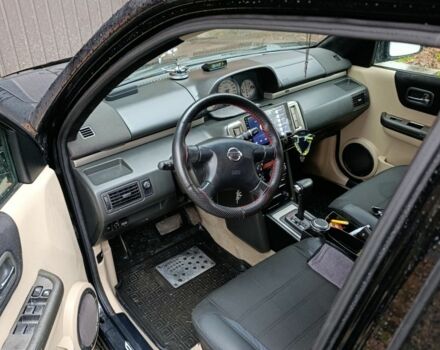 Чорний Ніссан ІксТрейл, об'ємом двигуна 2 л та пробігом 213 тис. км за 7538 $, фото 3 на Automoto.ua