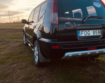 Черный Ниссан ИксТрейл, объемом двигателя 2.2 л и пробегом 400 тыс. км за 3222 $, фото 1 на Automoto.ua