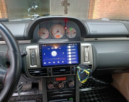 Чорний Ніссан ІксТрейл, об'ємом двигуна 2 л та пробігом 213 тис. км за 7538 $, фото 2 на Automoto.ua