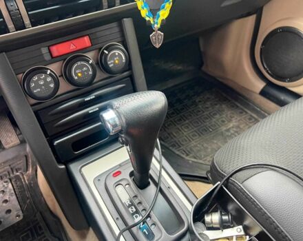 Черный Ниссан ИксТрейл, объемом двигателя 2 л и пробегом 215 тыс. км за 6490 $, фото 13 на Automoto.ua