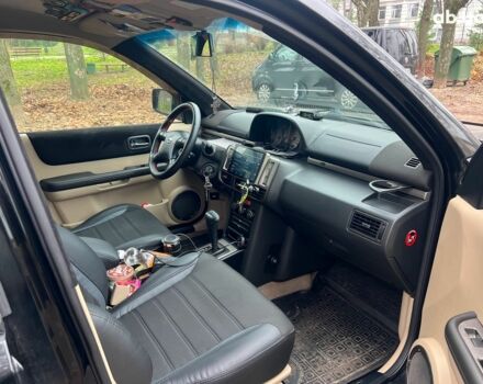 Чорний Ніссан ІксТрейл, об'ємом двигуна 2 л та пробігом 215 тис. км за 6490 $, фото 17 на Automoto.ua