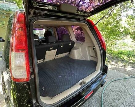 Черный Ниссан ИксТрейл, объемом двигателя 2.5 л и пробегом 287 тыс. км за 7700 $, фото 1 на Automoto.ua