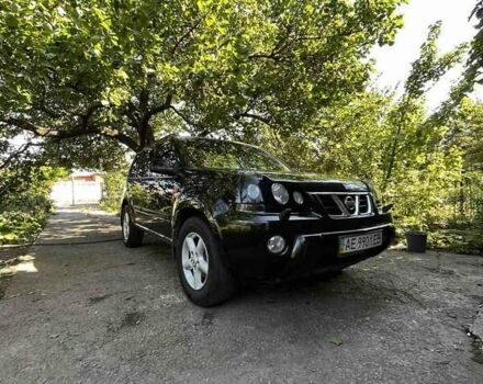 Черный Ниссан ИксТрейл, объемом двигателя 2.5 л и пробегом 287 тыс. км за 7700 $, фото 2 на Automoto.ua