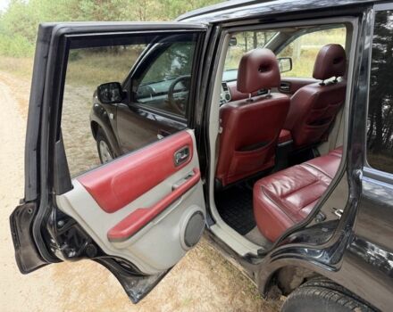 Черный Ниссан ИксТрейл, объемом двигателя 2.2 л и пробегом 225 тыс. км за 3800 $, фото 9 на Automoto.ua