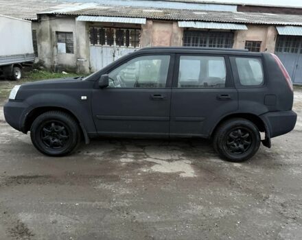 Черный Ниссан ИксТрейл, объемом двигателя 2.2 л и пробегом 278 тыс. км за 2800 $, фото 1 на Automoto.ua