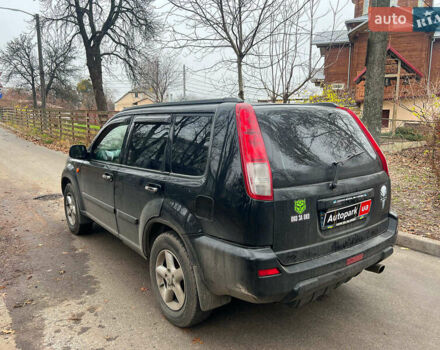 Черный Ниссан ИксТрейл, объемом двигателя 2 л и пробегом 215 тыс. км за 6490 $, фото 6 на Automoto.ua