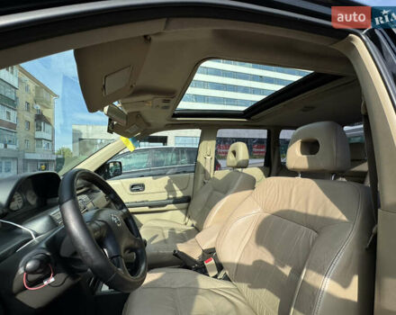 Черный Ниссан ИксТрейл, объемом двигателя 2.5 л и пробегом 318 тыс. км за 8000 $, фото 15 на Automoto.ua