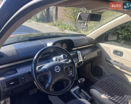 Черный Ниссан ИксТрейл, объемом двигателя 2.49 л и пробегом 176 тыс. км за 7800 $, фото 7 на Automoto.ua