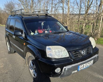 Черный Ниссан ИксТрейл, объемом двигателя 2 л и пробегом 365 тыс. км за 4023 $, фото 4 на Automoto.ua