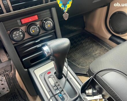 Чорний Ніссан ІксТрейл, об'ємом двигуна 2 л та пробігом 215 тис. км за 6490 $, фото 13 на Automoto.ua