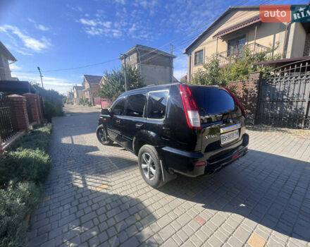 Черный Ниссан ИксТрейл, объемом двигателя 2.49 л и пробегом 176 тыс. км за 7800 $, фото 2 на Automoto.ua