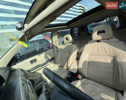 Черный Ниссан ИксТрейл, объемом двигателя 2.5 л и пробегом 318 тыс. км за 8000 $, фото 16 на Automoto.ua