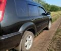 Черный Ниссан ИксТрейл, объемом двигателя 2.49 л и пробегом 320 тыс. км за 6000 $, фото 9 на Automoto.ua
