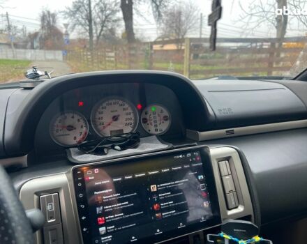 Чорний Ніссан ІксТрейл, об'ємом двигуна 2 л та пробігом 215 тис. км за 6490 $, фото 12 на Automoto.ua