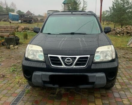 Черный Ниссан ИксТрейл, объемом двигателя 2.2 л и пробегом 370 тыс. км за 2950 $, фото 1 на Automoto.ua