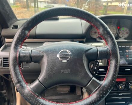 Чорний Ніссан ІксТрейл, об'ємом двигуна 2 л та пробігом 215 тис. км за 6490 $, фото 11 на Automoto.ua