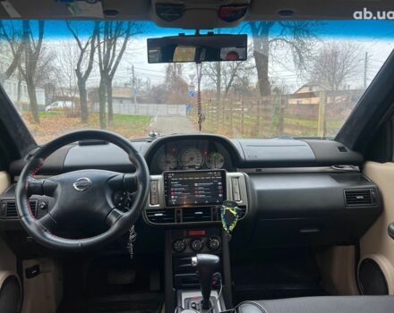 Чорний Ніссан ІксТрейл, об'ємом двигуна 2 л та пробігом 215 тис. км за 6490 $, фото 14 на Automoto.ua