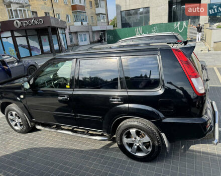 Черный Ниссан ИксТрейл, объемом двигателя 2.5 л и пробегом 318 тыс. км за 8000 $, фото 6 на Automoto.ua