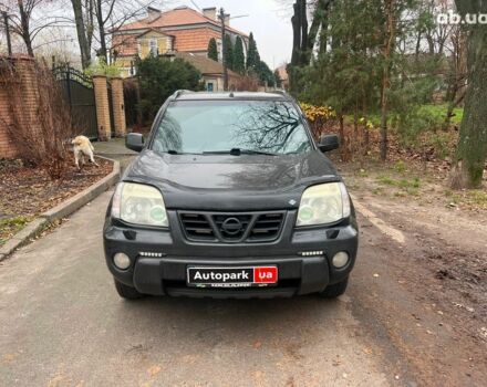 Чорний Ніссан ІксТрейл, об'ємом двигуна 2 л та пробігом 215 тис. км за 6490 $, фото 1 на Automoto.ua