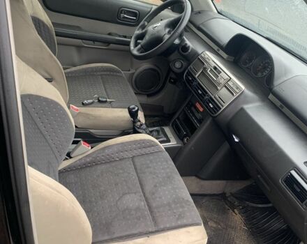 Черный Ниссан ИксТрейл, объемом двигателя 2.2 л и пробегом 370 тыс. км за 2950 $, фото 7 на Automoto.ua