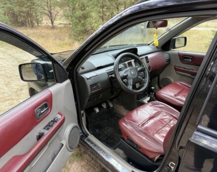 Черный Ниссан ИксТрейл, объемом двигателя 2.2 л и пробегом 225 тыс. км за 3800 $, фото 10 на Automoto.ua