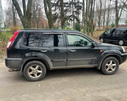 Черный Ниссан ИксТрейл, объемом двигателя 2 л и пробегом 215 тыс. км за 6490 $, фото 3 на Automoto.ua