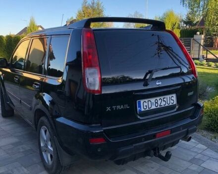 Черный Ниссан ИксТрейл, объемом двигателя 2.2 л и пробегом 310 тыс. км за 2700 $, фото 1 на Automoto.ua