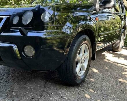 Черный Ниссан ИксТрейл, объемом двигателя 2.5 л и пробегом 287 тыс. км за 7700 $, фото 21 на Automoto.ua